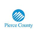 A blue circle with the words pierce county in it.