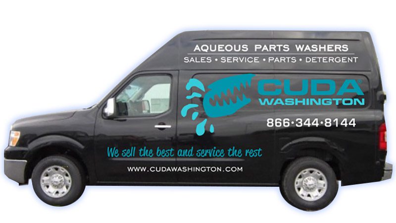 A black van with the words " aqueous parts wash " written on it.