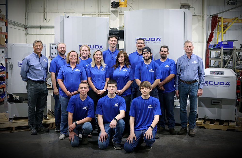 Group of workers in blue shirts